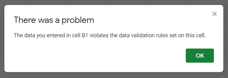 shows the default error message presented to users when the reject invalid input is chosen, it reads There was a problem, the data you entered in cell B1 violates the data validation rules set on this cell